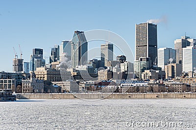Montreal Skyline and Frozen St Lawrence river Editorial Stock Photo