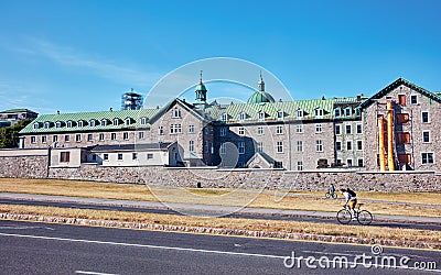 Exterior of historical Hotel-Dieu du Montreal hospital in Quebec, Canada Editorial Stock Photo