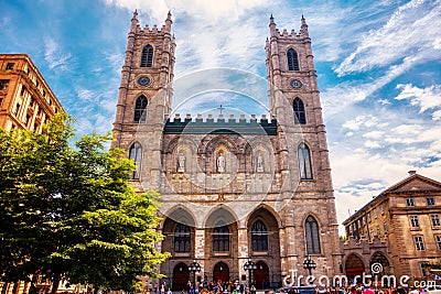 Majestic front view of historical cathedral Notre-Dame Basilica of Montreal on a sunny day in Montreal, Quebec, Canada Editorial Stock Photo