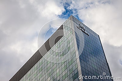 CHUM logo, in front of one of their main building in Montreal. Editorial Stock Photo