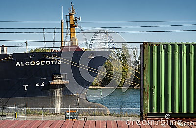 Montreal port scene with boat containers and ferris wheel Editorial Stock Photo