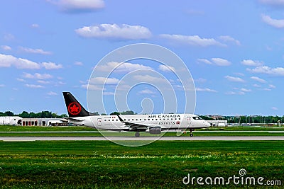 Montreal, Quebec, Canada - August 18, 2018: An Embraer 175 of Air Canada Express taking off from Montreal YUL Editorial Stock Photo