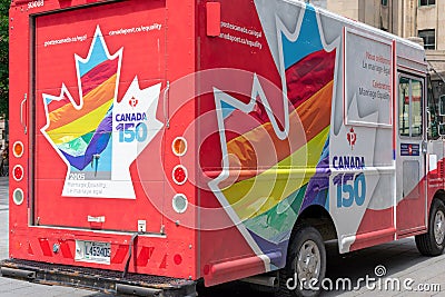 Montreal, Quebec/Canada - 07-17-2018 Colorful Canadian mail truck with rainbow graphics Editorial Stock Photo