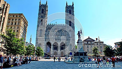 Tourists in front of the Notre-Dame Basilica in Old Montreal Editorial Stock Photo