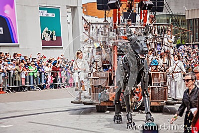 Montreal, Quebec, Canada - May 21, 2017: Place des Festivals - open-air event space. Walking dog at the Giant marionettes event Editorial Stock Photo