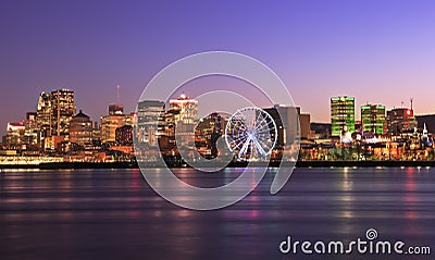 Montreal skyline at dusk and St Lawrence River Stock Photo