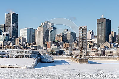 Montreal Skyline and Frozen St Lawrence river Editorial Stock Photo