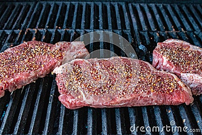 Steak that has been spiced with Montreal steak spice Stock Photo