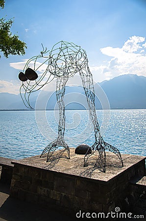 Montreux, Switzerland - September 14, 2017: Figure silhouette of bird of wire on promenade of the Lake Leman Editorial Stock Photo