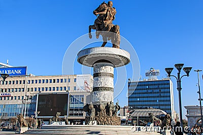 Monument of Alexander The Great in Skopje's main square with people passing by. Editorial Stock Photo