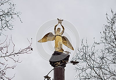 Monument angel with pigeons at the krasnodar city Stock Photo