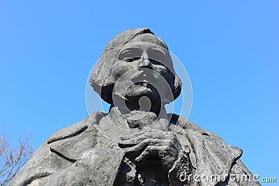 Monument-bust to the Russian writer of Ukrainian origin Nikolai Gogol in the National Museum-Reserve M.V. Gogol Editorial Stock Photo