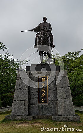 Monument of Emperor Todo Takatora in Fukiage Park, near water castle Imabari. Imabari, Ehime Prefecture, Japan Stock Photo