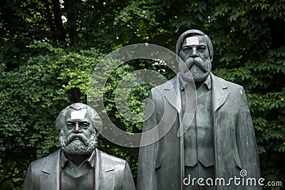 Monument , monument, of Marx and Engels in Berlin with the message: propaganda covers totalitarian structures Editorial Stock Photo