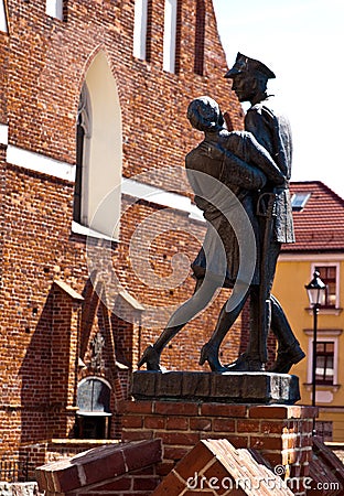 Monument of soldier with girl at Grudziadz Spichrze Editorial Stock Photo