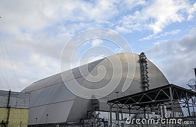 Monument and 4th nuclear reactor under new sarcophagus in Chernobyl Exclusion Zone Editorial Stock Photo