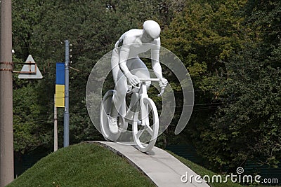 Monument to a bicyclist in KharkÑ–v Editorial Stock Photo