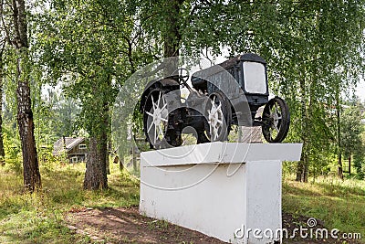 The first tractor on the pedestal Stock Photo