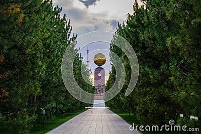 Monument to the Independence and Humanism in gold globe form at the Independence square, Tashkent. Stock Photo