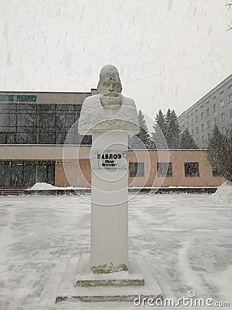 Monument to the Nobel laureate Pavlov Ivan Petrovich. Winter, snowfall. Minsk, Belarus. Editorial Stock Photo