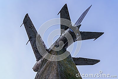 Monument to an old retro vintage airplane. Background with copy space Editorial Stock Photo