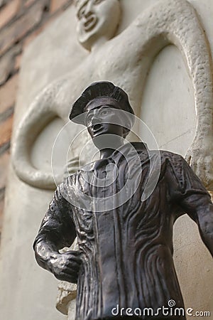 Monument to a screaming man in medieval clothes. Sculpture in an old European city Editorial Stock Photo