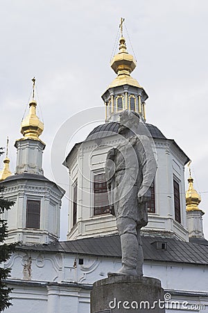 Monument to Semyon Dezhnev against the background of the domes of the Cathedral of the Assumption of the Blessed Virgin Mary Editorial Stock Photo