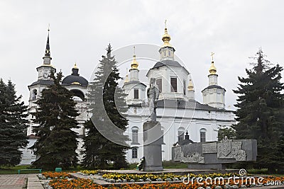 Monument to Semyon Ivanovich Dezhnev against the background of the Cathedral of the Assumption of the Blessed Virgin Mary Editorial Stock Photo