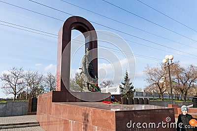 Monument to soldiers-internationalists in a distorted perspective on the street of the Krasnoyarsk city . Architect S.Gerashchenko Editorial Stock Photo