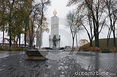 Monument to Victims of Famine devoted to genocide victims of the Ukrainian people of 1932-1933. Kyiv. Ukraine. Foggy autumn mornin Editorial Stock Photo
