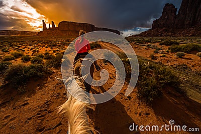 Monument Valley Horseback Riding Stock Photo