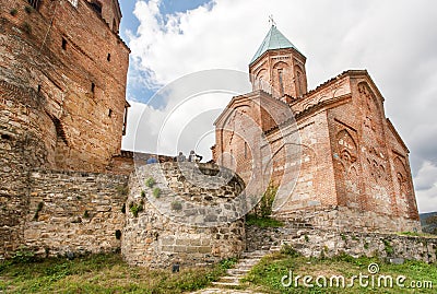 Monumental stone walls of sacred orthodox Church of the Archangels. Built in 16th century, Gremi town, Georgia. Stock Photo