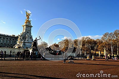 Monuments and people, tourist in front of Buckingham Palace. Editorial Stock Photo