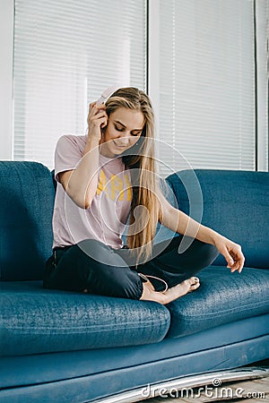 Mood booster playlist, feel-good songs enjoy music, have fun. Cheerful young blogger girl enjoy favourite playlist in headphones, Stock Photo
