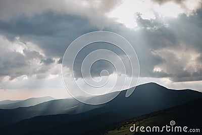 Moody mountains Carpathians tonal perspective sunbeams sunshine nature hiking Stock Photo