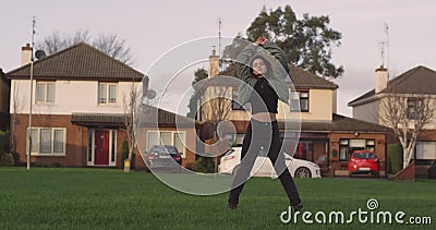 Mooie magere jonge vrouw, die onderaan de straat op landgoed lopen, kijkt zij aan de camera die dan zich passionately bewegen stock videobeelden Mooie magere jonge vrouw, die onderaan de straat op landgoed lopen, kijkt zij aan de camera die dan zich passionately bewegen stock videobeelden