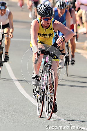 MOOLOOLABA, AUSTRALIA - SEPTEMBER 14 : Unidentified participants in cycle leg of sunshine coast triathlon on September 14, 2014 in Editorial Stock Photo