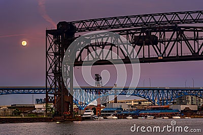 Moon over bridges Stock Photo