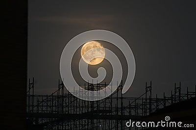 Moon over city Stock Photo