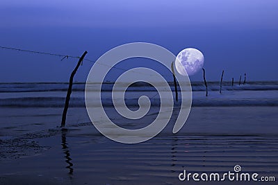 Moon over ocean, night scene Stock Photo