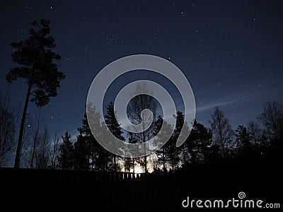 Moon rise Virgo constellation stars night sky Stock Photo