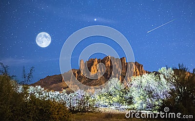 Moon Rises over Superstition Mountains Stock Photo