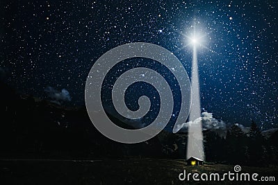 moon shines over the manger of christmas of Jesus Christ. Stock Photo