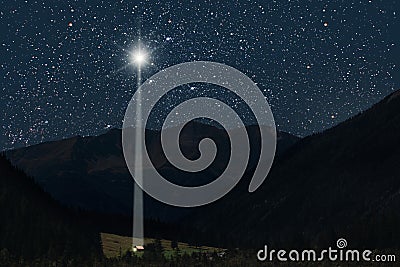The moon shines over the manger of christmas of Jesus Christ Stock Photo