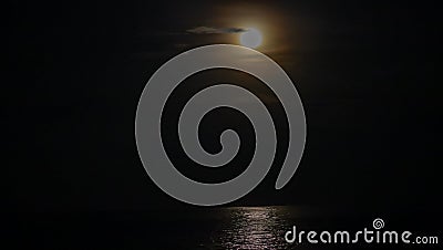 The moon shines over Maruni Manokwari beach. Stock Photo
