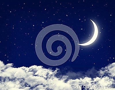 Moon and stars in a cloudy night blue sky Stock Photo