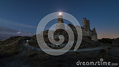 Moon in a twilight over the ruins of an old castle Editorial Stock Photo