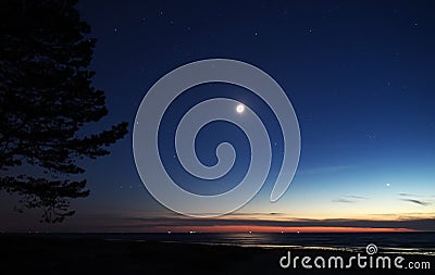 Moon and Venus observing after sunset Stock Photo