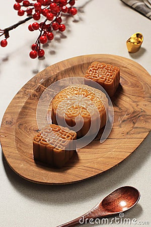 Mooncake on Light Background with Tea. Concept Moon Cake on Mid Autumn Festival or Chinese New year Imlek. Mooncake Popular as Stock Photo