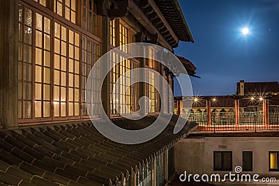 Moonlight over building architecture Stock Photo